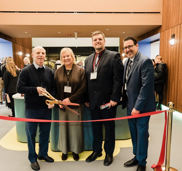 Larry Kinitsky, Sue Ruzenski, Ryan Odland and John Filek at the ribbon cutting for the new Walters-Smithdas atrium.