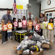 The Kindness Club at Manhasset’s Munsey Park Elementary School collected over 1,500 pairs of socks for people in need.
