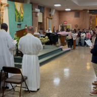 St. Brigid Catholic Church held a vigil followed by a multilingual mass celebration in support of immigrant neighbors.