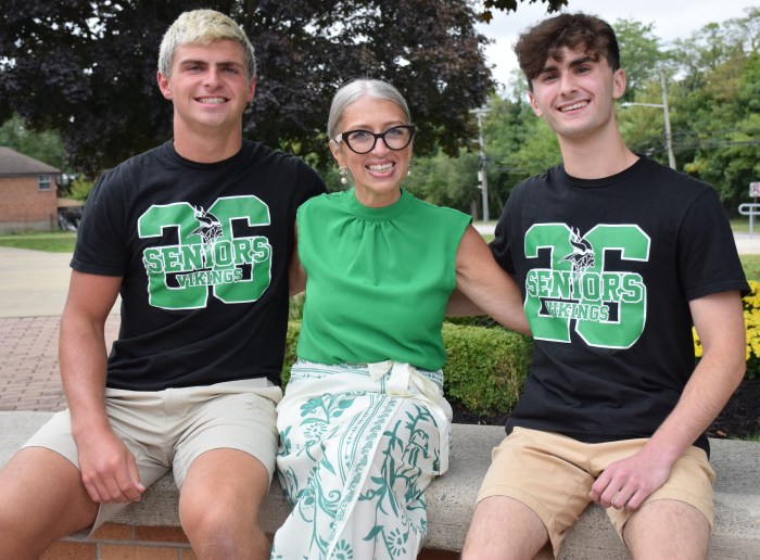 Seaford High School Principal Nicole Schnabel congratulated Matthew Kind and Brian Karaman on earning the top tworanks.