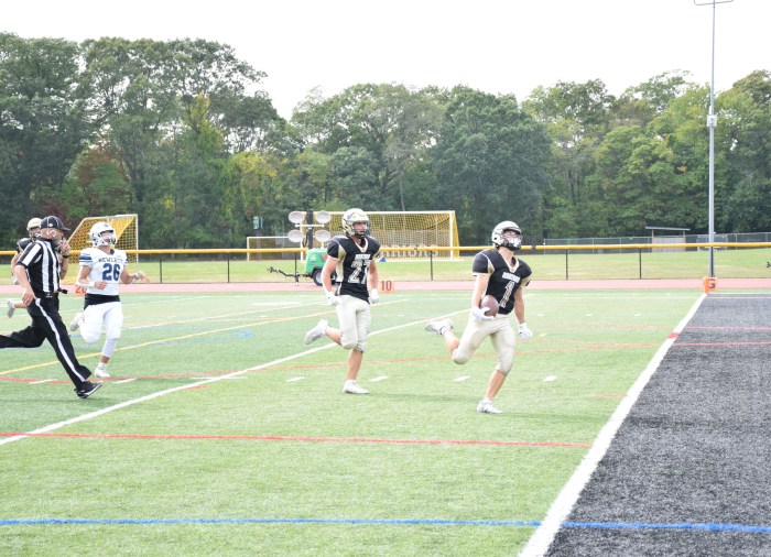 Wantagh High School's Varsity football team, pictured here during its homecoming game, defeated Bethpage 28-21 to win its second straight Nassau County championship.