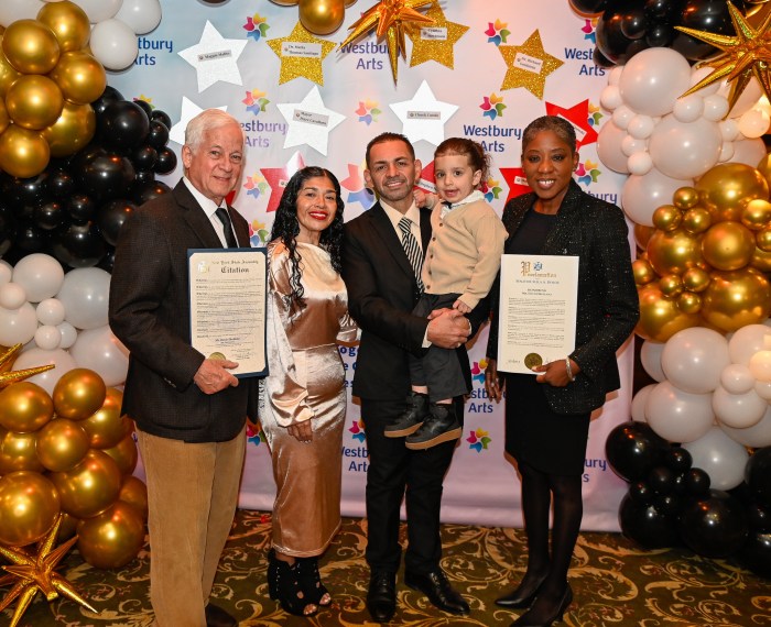 Assembly Member Charles Lavine, Cynthia Orellana, Honoree Davis Orellana,Travis Orellana and state Sen. Siela Bynoe.