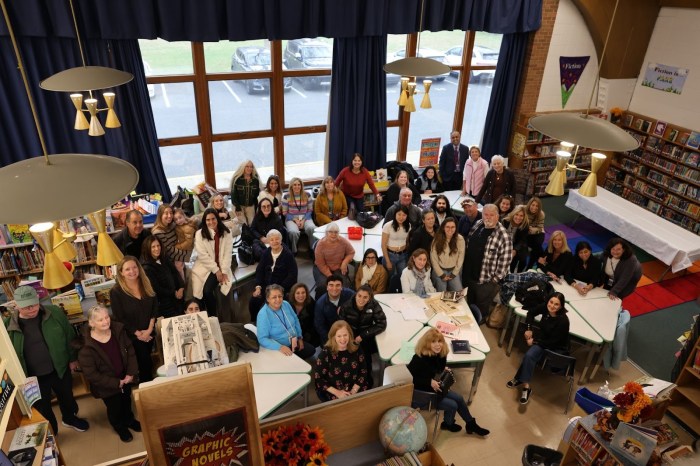 Alumni staff and administration, families, and community members attended Guggenheim’s 2000 time capsule reveal.