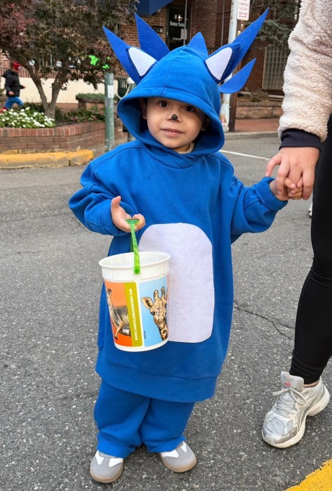 Ezra, 3, showed off his Halloween candy.
