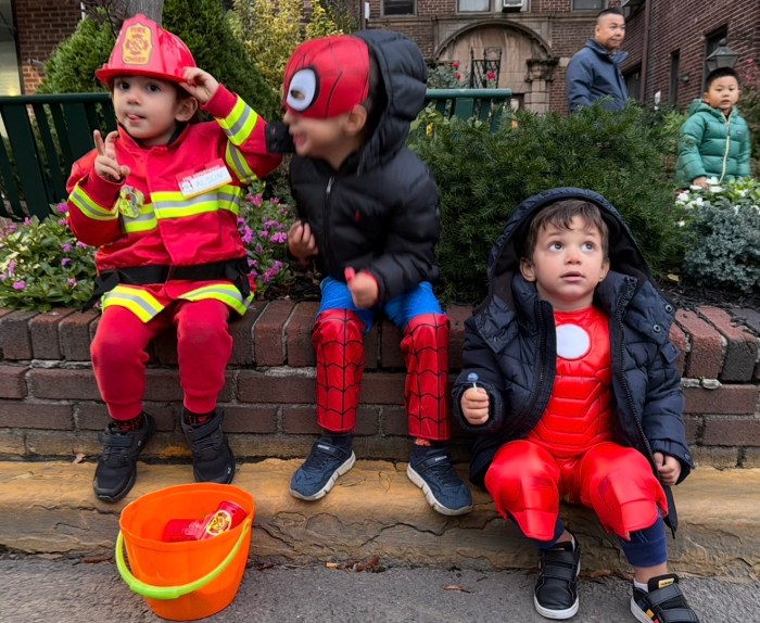 Alson Kola, 3, Christian Popaj, 3 and Matteo Popaj, 2, attended the Halloween event.