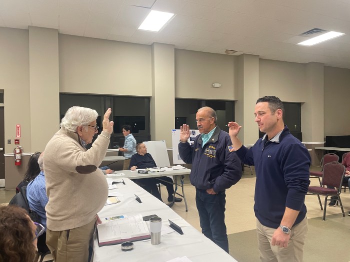 Mayor Michael Koblenz swearing in David Diamond and Scott Fishkind as co-chairs of the Office of Emergency Management.