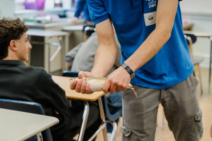 A representative from the Cold Spring Harbor Fish Hatchery introduced students to two live trout and provided an in-depth look at centuries-old fish breeding techniques.