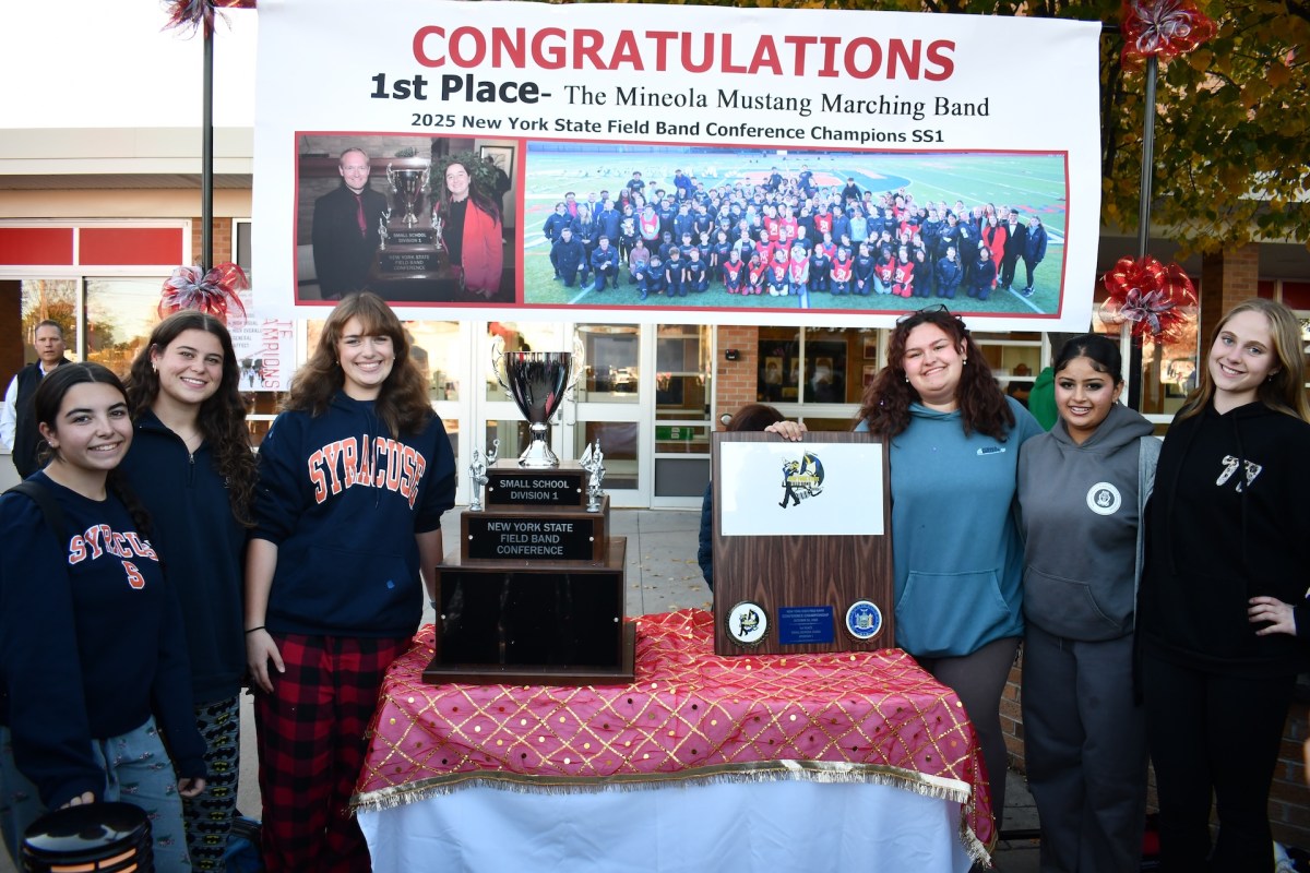 Mineola Marching Band Drum and Flag Majors with NYSFBC championship trophy (L-R): Madison DeCillis, Keira Faley, Mary Elias, Sarah Geoghan, Simranjot Singh and Madeleine Christianson.