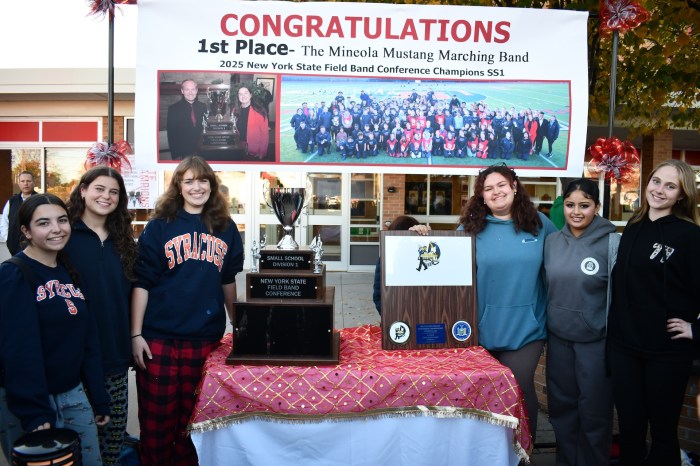 Mineola Marching Band Drum and Flag Majors with NYSFBC championship trophy (L-R): Madison DeCillis, Keira Faley, Mary Elias, Sarah Geoghan, Simranjot Singh and Madeleine Christianson.
