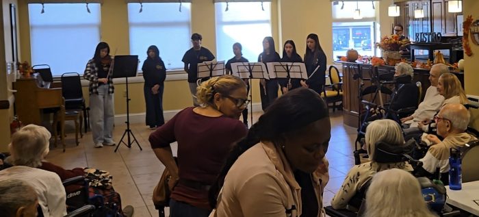 Music 4 Souls performing for community members