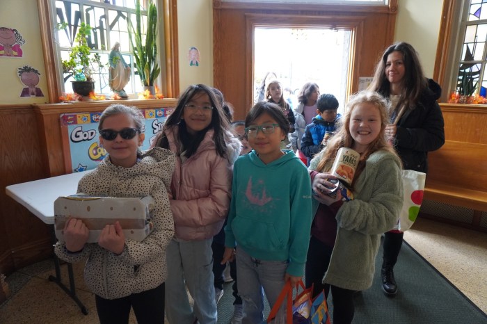 Herricks students sort through donated food