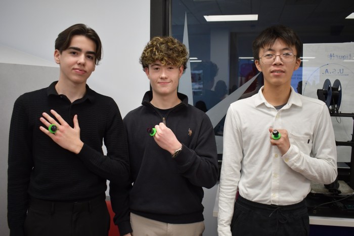 Mineola High School learners are all smiles and pride as they show off their “wedding rings” at the school’s annual AP Research Wedding on Dec. 5.