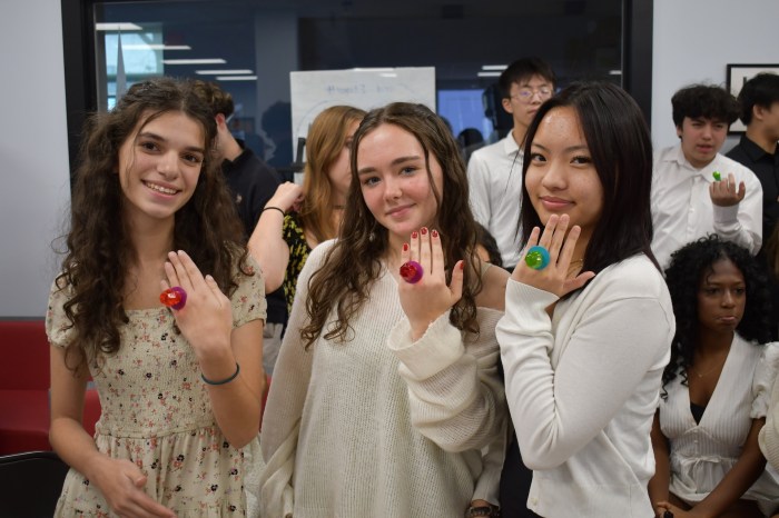 Mineola High School learners are all smiles and pride as they show off their “wedding rings” at the school’s annual AP Research Wedding on Dec. 5.