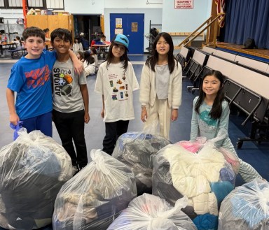 Students at Herricks Coat Drive
