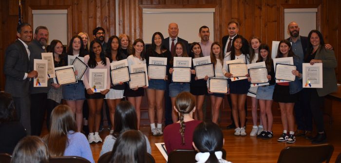 Wildcats 12U team with coaches and local officials
