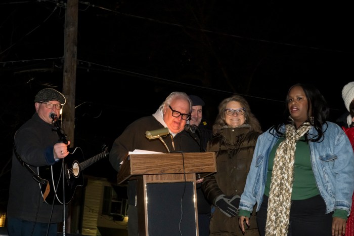 Lou Federico, vice president of events at Roslyn Chamber and other board members at the Roslyn holiday lighting.