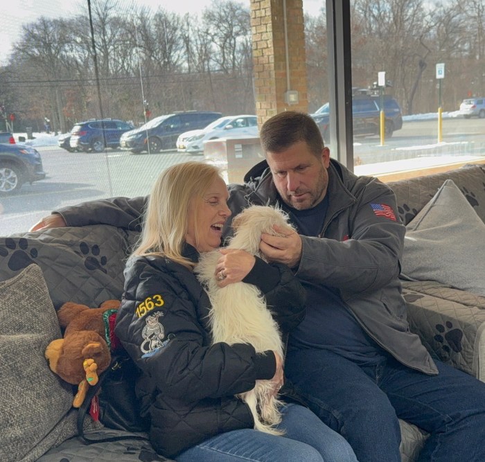 Penny and David Tierney with their puppy Blue.