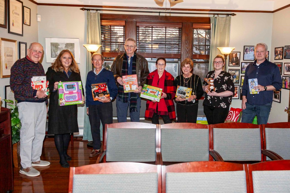 Nassau County Legislature Minority Leader Delia DeRiggi-Whitton with Baxter Estates Board of Trustees members and neighbors.