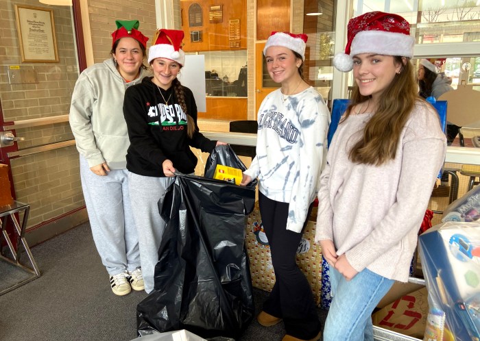 North Shore High School Key Club members packed the toys to bring to the hospital. 