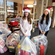North Shore High School Key Club members delivered toys to Cohen Children's Medical Center.