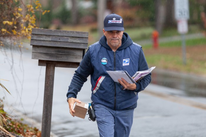 Richard Morales delivering mail. 