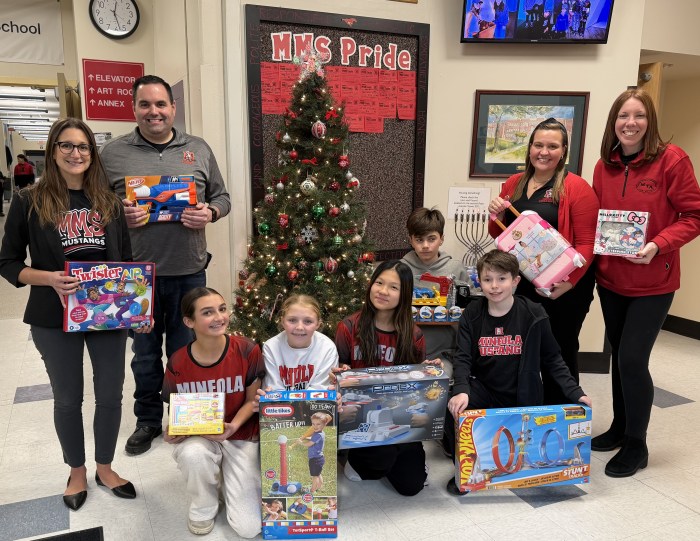Mineola Middle School student council members, Assistant Principal Ms. Nickole DiFilippi, Dean of Students Mr. Steve Benner, Principal Ms. Amy Trojanowski and 5th-grade teacher Ms. Jenna Cavuto