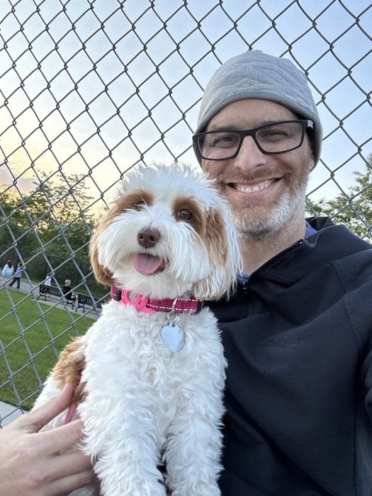 Joanah Gruda with the family dog.