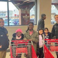 Members of the Port Washington Police Department were paired with children from the Litting House for a "shop with a cop" event.
