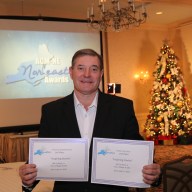 Bill Corbett with two Nor'easter awards from the Alliance for Community Media.