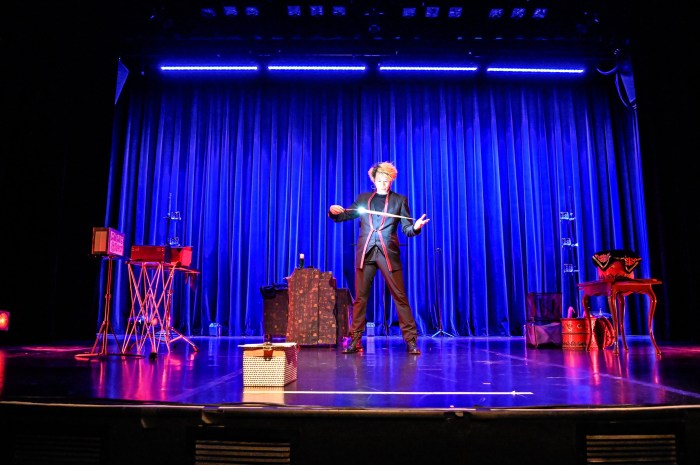 Magic Q, the Shanghai-born magician, showing his tricks to the audience