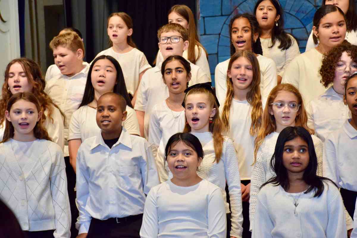 John Lewis Childs School’s fifth and sixth grade chorus performs on Dec. 18.