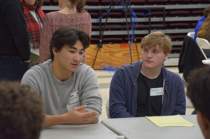 Locust Valley High School alumnus Louis Singe speaks about his college experience with current junior Dominic Spina.