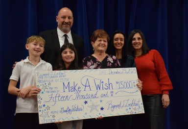 Lockhart Elementary School’s annual fundraiser for the Make-A-Wish Foundation raised $15,000, which was unveiled at a concert.
