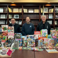 Plainview Water District Commissioner Andrew Bader, Commissioner Marc Laykind and Commissioner Michael Chad (L. to R.) with the Toys for Tot’s donations at the district's headquarters.