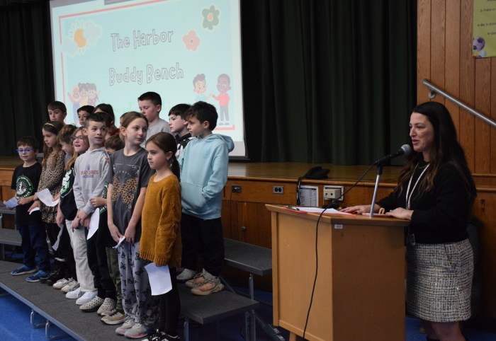 Principal Jennifer Bisulca introduced the students during a ceremony who came up with the idea for adding a buddy bench.