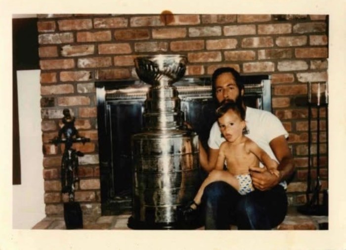 Gabe Rotter with New York Islanders player Bob Nystrom and the 1981 Stanley Cup. Nystrom lived across the street from Rotter and his parents developed a close friendship. 