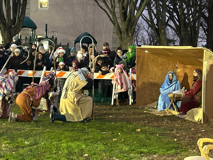 The event starts with a Nativity scene put on by children.