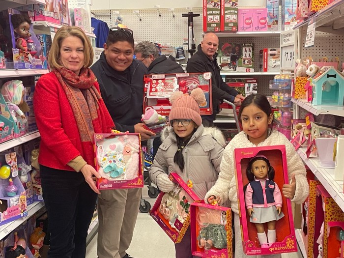 North Hempstead Town Supervisor Jennifer DeSena joined children helping them find the perfect toys to bring home.