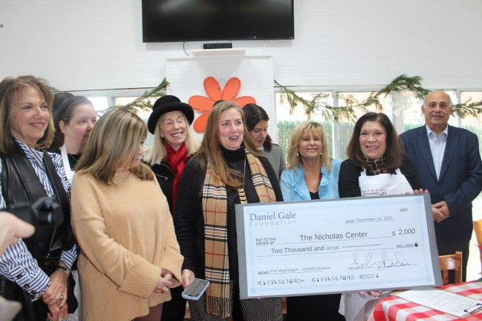 The Daniel Gayle Foundation presented The Chocolate Lab with a check.