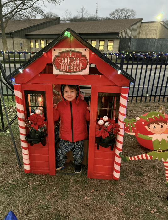 A child enjoying the Village of East Hills Christmas celebration.