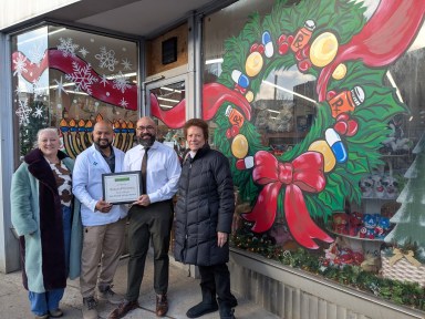 Beacon Pharmacy won best painted window from the Port Washington Chamber of Commerce Port Holiday Magic Window Decorating Contest.