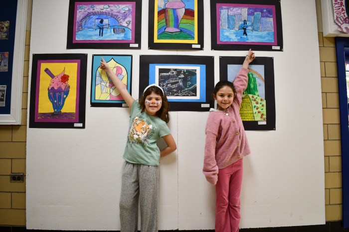 Students show off their artwork at the Herricks student show.