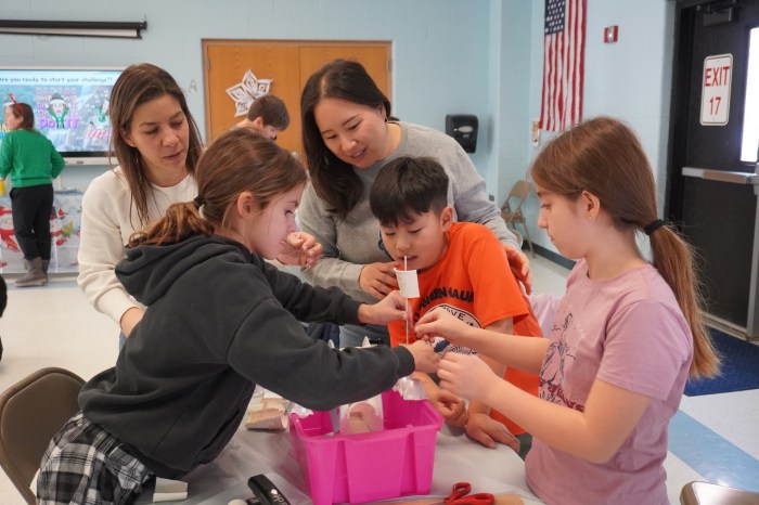 Center Street Elementary School students challenge themselves with STEM work. 