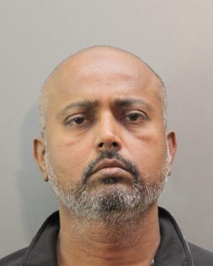 A Bellerose man was charged with murdering his estranged wife in Herricks.