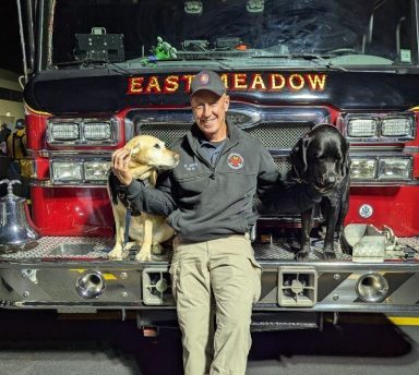Nassau Fire Marshal's office investigators, K-9 Leah, Matt Kerin, and K-9 Chuck, (L. to R.).