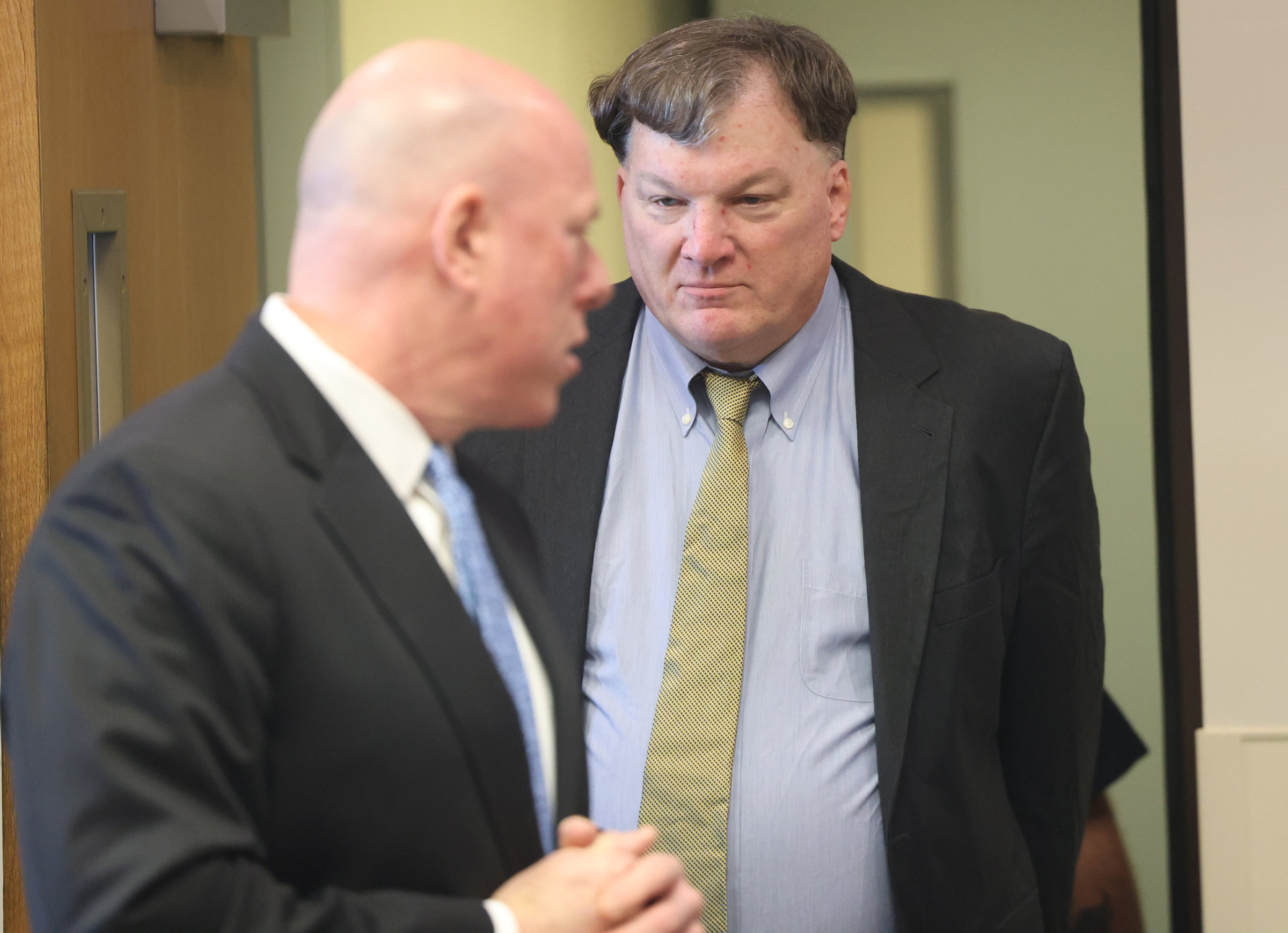 Alleged Gilgo killer Rex Heuermann appears in front of Judge Tim Mazzei alongside his attorney Michael J. Brown at Suffolk County Court in Riverhead on Tuesday, Jan. 13, 2026.