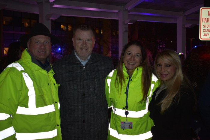 Michael Rosenblut, CEO and President of Parker Institute, Christopher Devane, mayor of New Hyde Park, Jess Dunbar, Director of Marketing and Public Affairs of the Parker Institute, and New Hyde Park Trustee Eve Sheikh, (L. to R.), on New Year's Eve. 