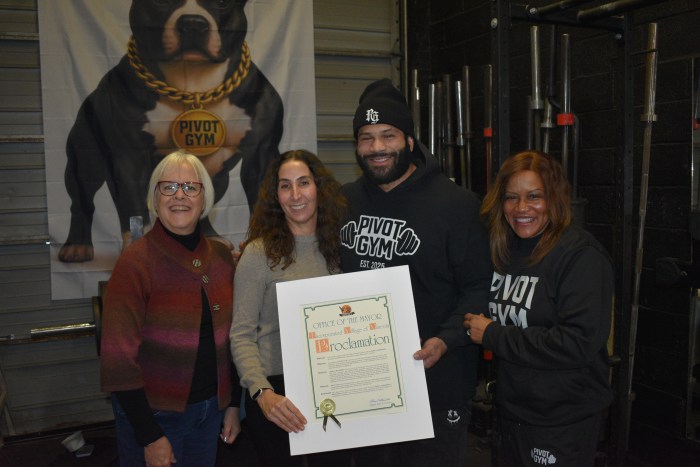 Mineola officials Donna Solosky, trustee, and Janine Sartori, deputy mayor, joined Josh Jefferson and his mom, Latonya Jefferson (L. to R.) at Pivot Gym.