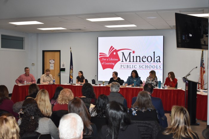 Mineola's school board addressed a crowded room full of parents and community members at its recent meeting. 