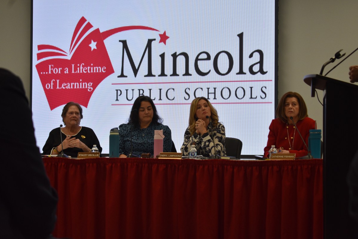 Acting superintendent Catherine Fishman (R.) addressed the community alongside members of the school board, Trustee Margaret Ballantyne-Mannion, Vice President Stacey DeCillis and President Cheryl Lampasona, (L. to R.).
